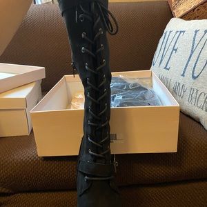 Lace up tall boots